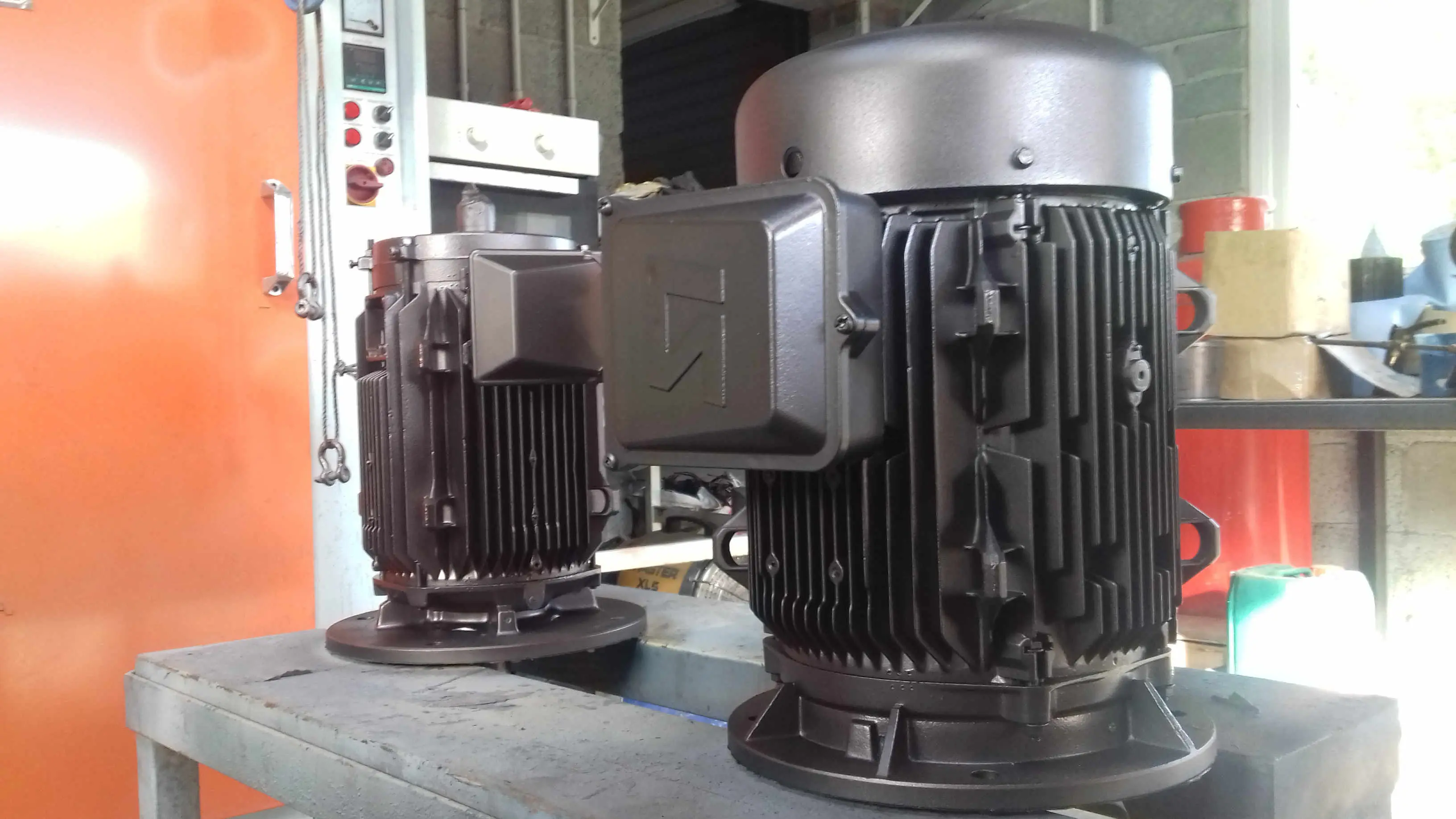 11.5 and 18.5 kilowatt motors rewound, painted and ready for delivery back to the customer.
